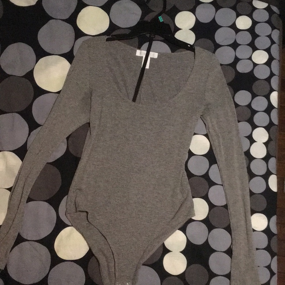Long sleeve body suit with deep neck